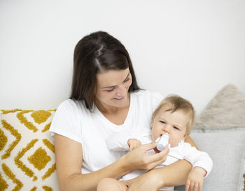 Mother and daughter at home