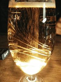 Close-up of beer glass on table