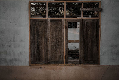 Window of old abandoned house