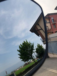 View of street and buildings against sky