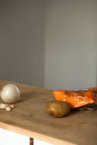 Close-up of orange slice on cutting board