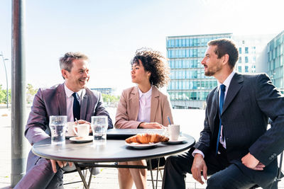 Business colleagues working in restaurant