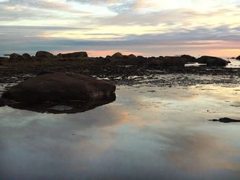 Scenic view of sea against sky during sunset