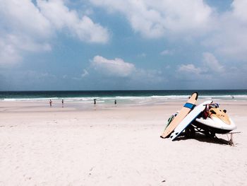 Man on beach against sky