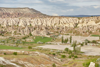 View of landscape against cloudy sky