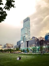 Buildings in city against sky