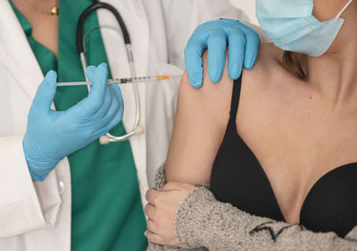 Low section view of two people