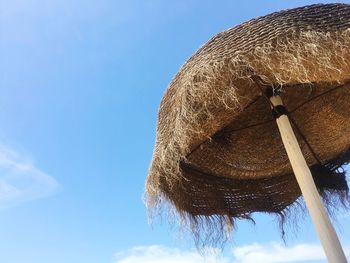 Low angle view of built structure against blue sky