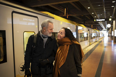 Couple on train station platform