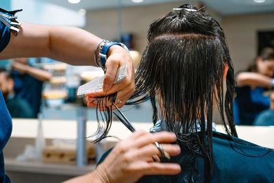 Man getting haircut at salon