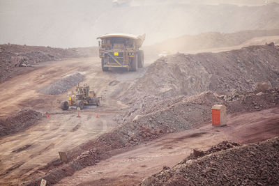 Mining activity, mining dump truck, high angle view of truck working on field