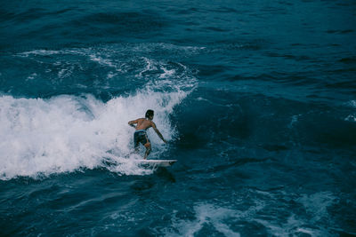 Man surfing in sea