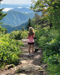 Rear view of woman on mountain