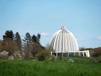 Built structure on field against clear sky