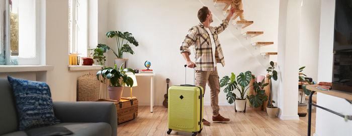 Potted plant against wall