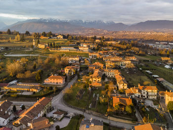 High angle view of buildings in city against sky