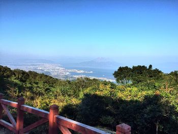 Scenic view of landscape against clear blue sky