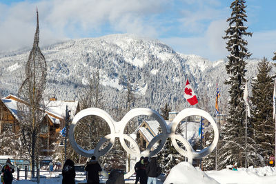 Group of people on snow covered mountain