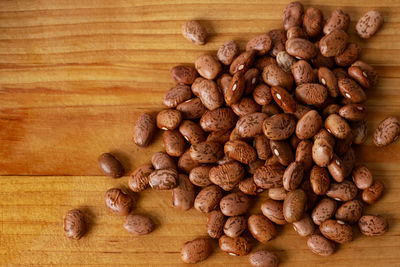 High angle view of roasted coffee beans on table