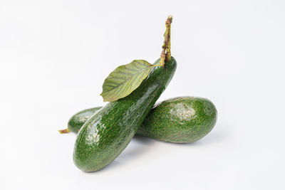 Close-up of bananas against white background