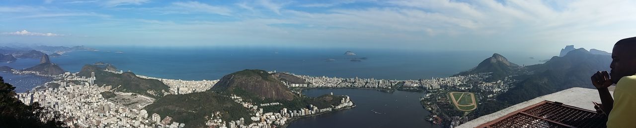 Panoramic view of river against cloudy sky