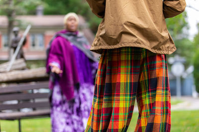 Rear view of couple standing outdoors