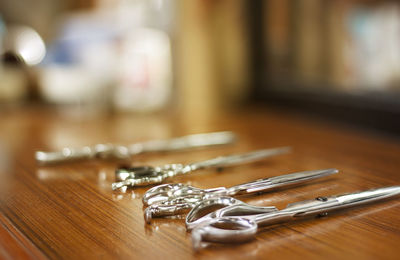 Close-up of metallic objects on table