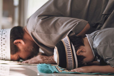 Boy sleeping in bed