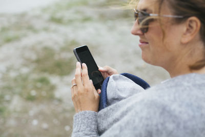 Woman using cell phone