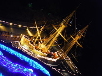 Aerial view of illuminated city at night