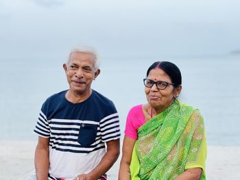 Portrait of a smiling young man on beach