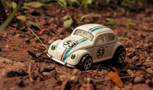 Close-up of toy car on field