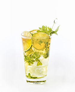 Close-up of drink against white background