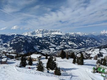 Scenic view of snowcapped mountains against sky