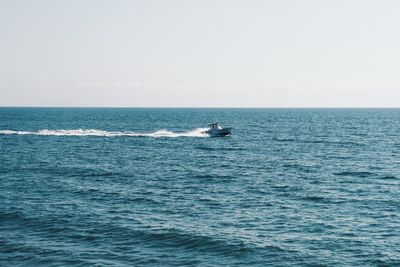 Scenic view of sea against clear sky