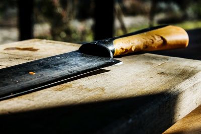 Close-up of rusty metal on table