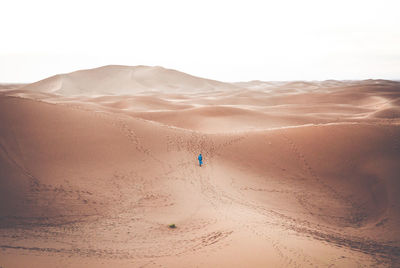 Scenic view of desert against clear sky