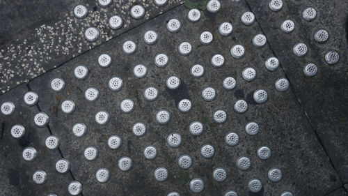 High angle view of manhole on street