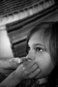 Close-up portrait of a girl looking away