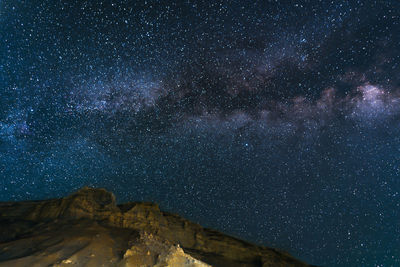 Low angle view of star field against sky at night