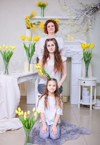 Happy mother's day. daughters congratulate their mother on women's day on march 8. 