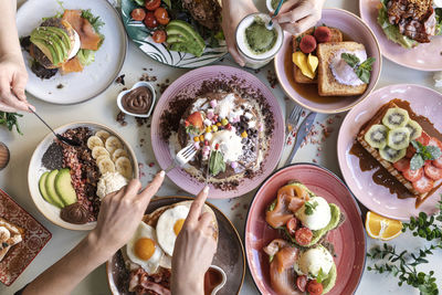 Brunch choice crowd food concept. family breakfast or brunch served on a table. aerial view.