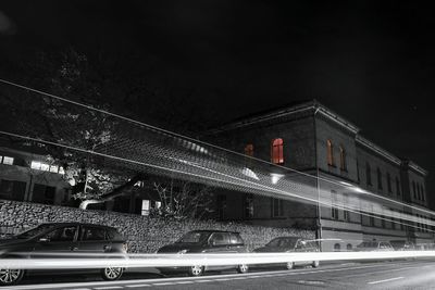 Low angle view of illuminated city at night