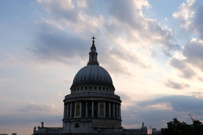 Low angle view of building against sky during sunset