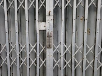 Full frame shot of closed metal gate