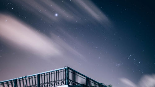 Low angle view of stars against sky at night