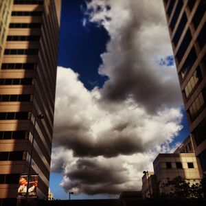 Low angle view of city against sky