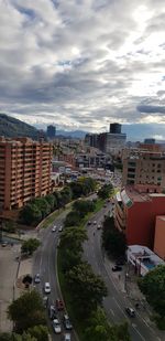 High angle view of buildings in city against sky