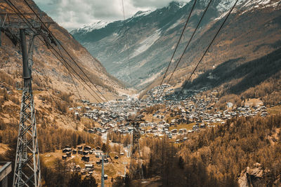 Aerial view of valley and mountains against sky