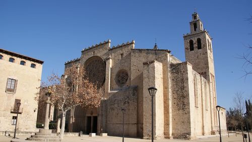 Low angle view of church against blue sky